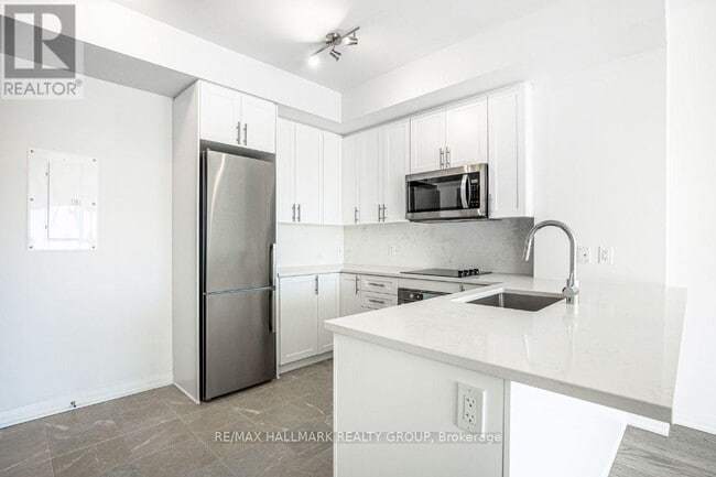 Photo du bâtiment - 805-1805 Carling Ave