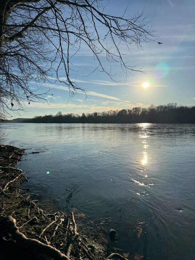 Building Photo - Riverfront home with parking, laundry, yard, river access