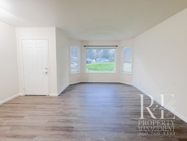 Building Photo - Duplex Living with Expansive Yard, LVP Flooring & Spacious Layout