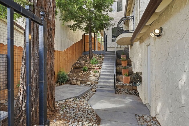 Building Photo - Updated Townhome in Prime Location | Gated Courtyard, Garage & Community Pool
