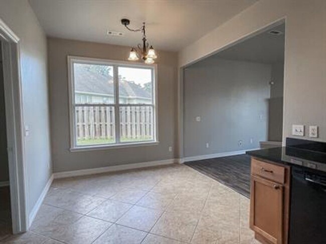 Building Photo - Come check out this centrally located, new...