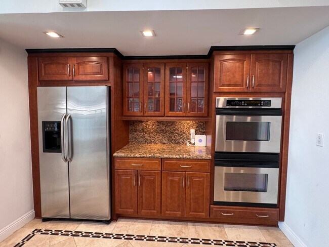 Building Photo - Beautifully remodeled 4 bedroom house in prime Woodland Hills Neighborhood