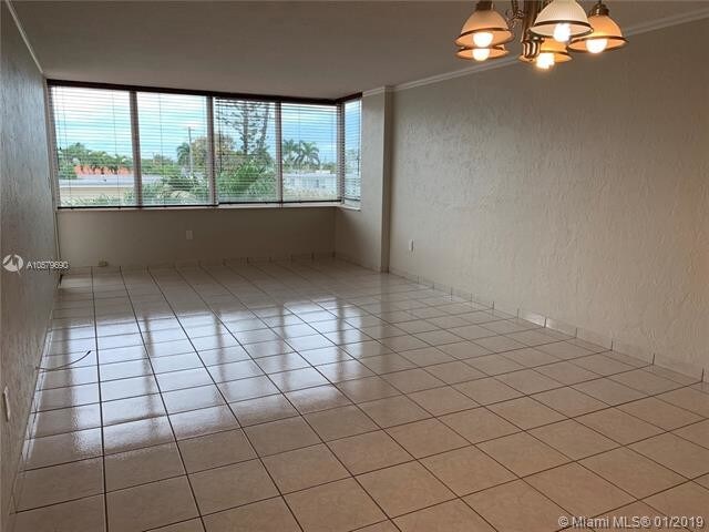 Building Photo - 8233  Harding Ave  302