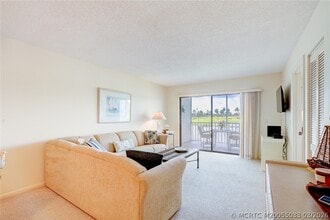Building Photo - 5593 NE Gulfstream Way