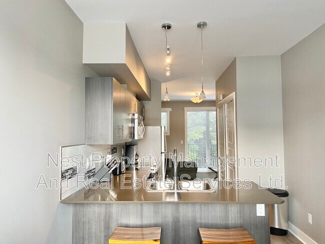 Photo du bâtiment - 110 Baxter Ave