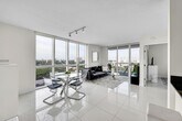 Foto principal - Stunning Furnished 2-Bed/2-Bath Condo with...