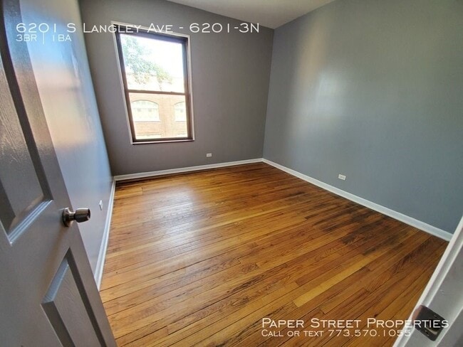 Building Photo - 6201 S Langley Ave
