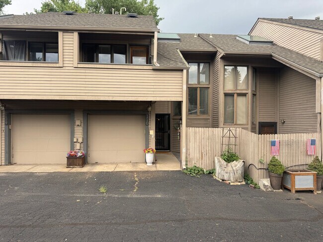 Building Photo - Bright 2BR Townhome with 3 Balconies & Private Patio