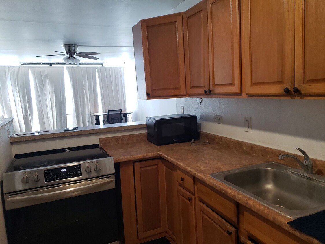 Primary Photo - 1 bd. 1 ba. Harbor Lights Unit - Partly Fu...