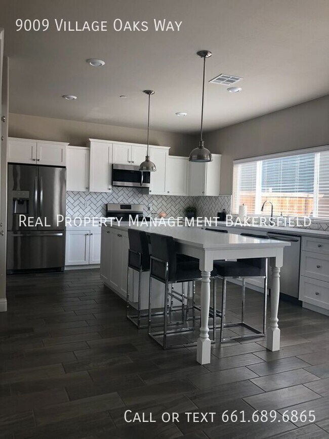 Foto del edificio - 9009 Village Oaks Way