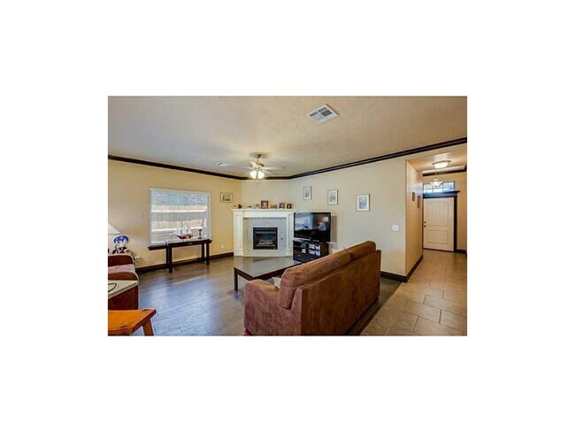 Building Photo - Contemporary Home + Wood Floors + Storm Shelter + Edmond Schools