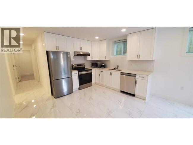 Building Photo - 1XX W 43rd Ave