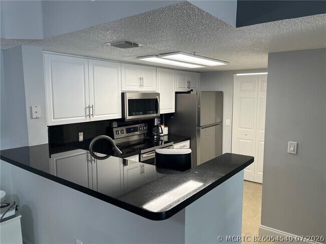 Building Photo - 5051 Wiles Rd
