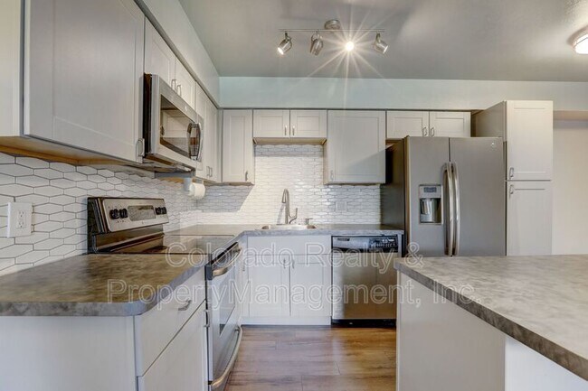 Building Photo - 5995 W Hampden Ave