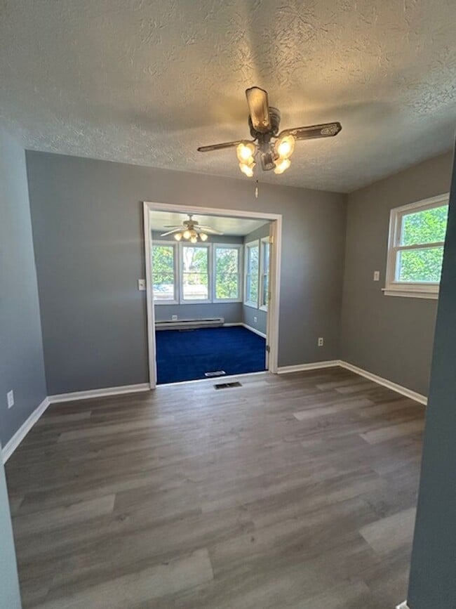 Building Photo - Bright Cape w/ Sunroom, Central Air, Big B...