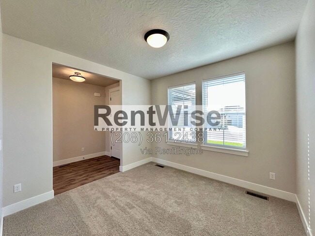 Building Photo - 5690 N Jumplist Ave