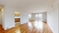 Located at Beverly Hill Terrace in Woodbridge, NJ, this well-appointed 2-bedroom, 2-bathroom residence offers a comfortable and functional single-floor layout. Rich hardwood flooring flows throughout the home, lending warmth and continuity to every room.

The spacious living room is bathed in natural light, with large sliding glass doors opening to a private balcony and a wide window framing outdoor views. The open sightline to the kitchen creates a cohesive living and dining area ideal for everyday living and entertaining.

The kitchen is well-equipped with warm wood cabinetry, granite countertops, stainless steel appliances including a gas range, refrigerator, and dishwasher, along with light vinyl flooring and a skylight-style overhead fixture that keeps the space bright.

Both bedrooms feature hardwood floors and clean white walls. The generously sized primary bedroom offers ample room for a full furniture arrangement, while a large closet provides excellent storage. The second bedroom is equally bright, with a window that brings in natural light.

The bathrooms are finished with granite-topped vanities and wood cabinetry. The home also includes multiple closets throughout, two hallways, and additional unclassified utility space, ensuring practical storage solutions at every turn.