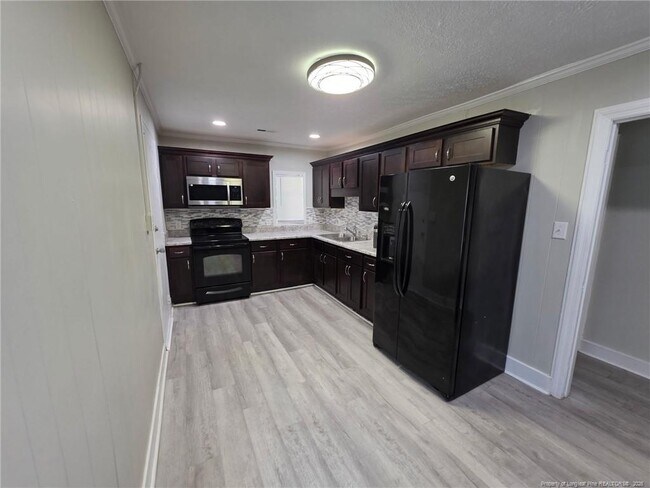 Building Photo - 2031 Womble Dr