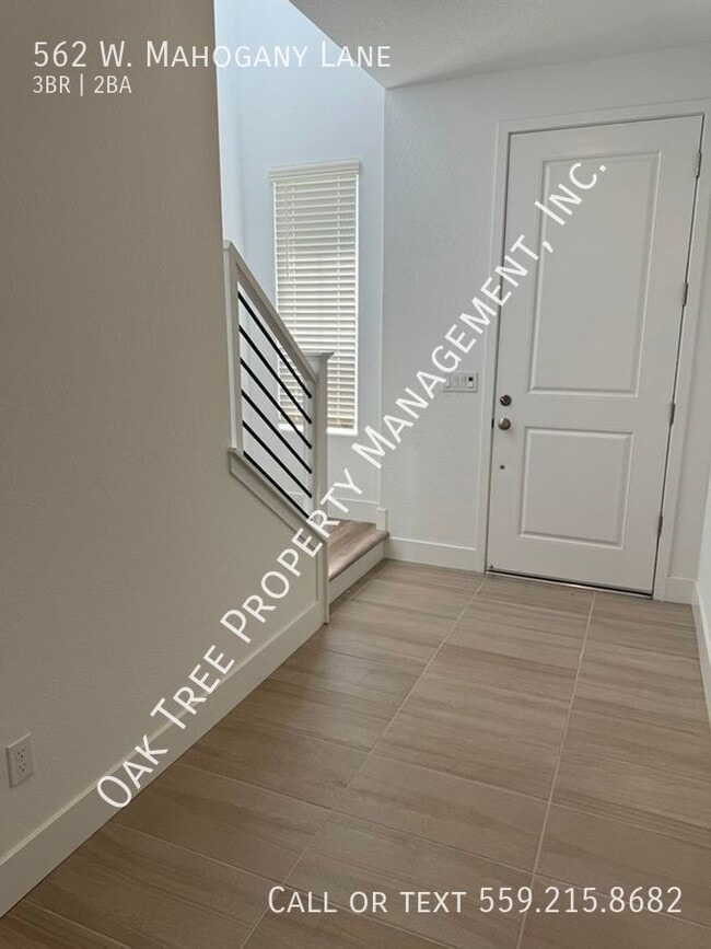 Building Photo - 562 W. Mahogany  (Spruce & Peach)