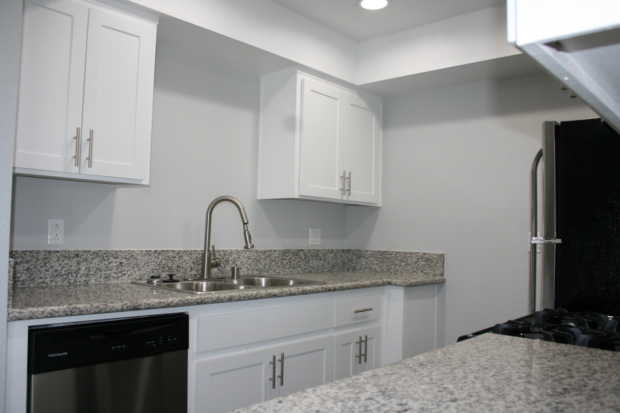 Granite Counters with custom cabinetry - Villa Rivera