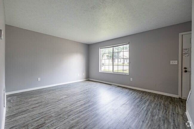 3BR, 2BA - 1,150SF - Living Room - Eagle Ridge Apartments