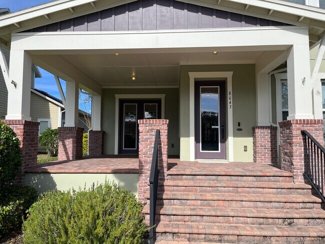Building Photo - Amazing Lake Nona 4 bedroom house with Lau...
