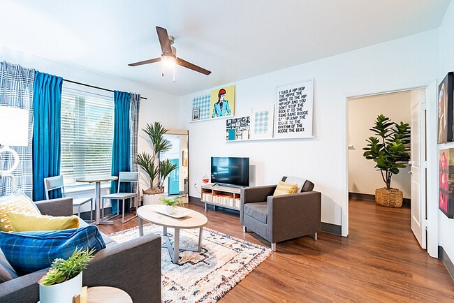 Experience the perfect blend of style and comfort in this chic living room. - Cambridge Hall at College Station