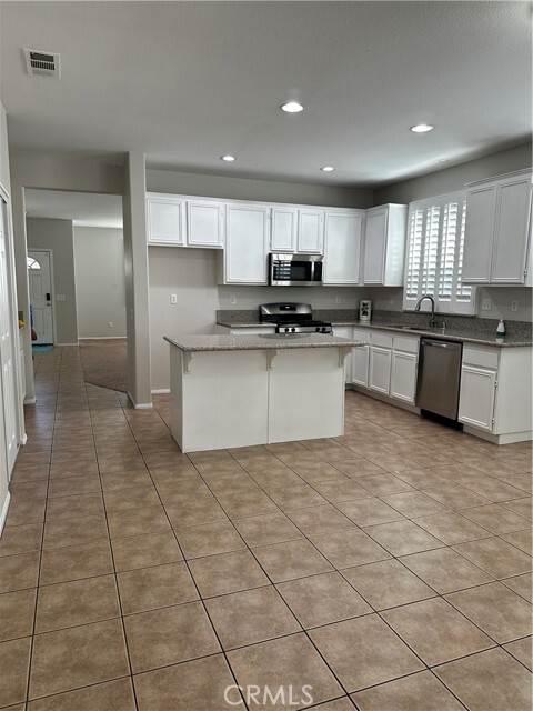 Building Photo - 15387 Avenida Fiesta