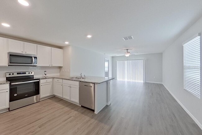 Building Photo - 8590 SW 44th Ct