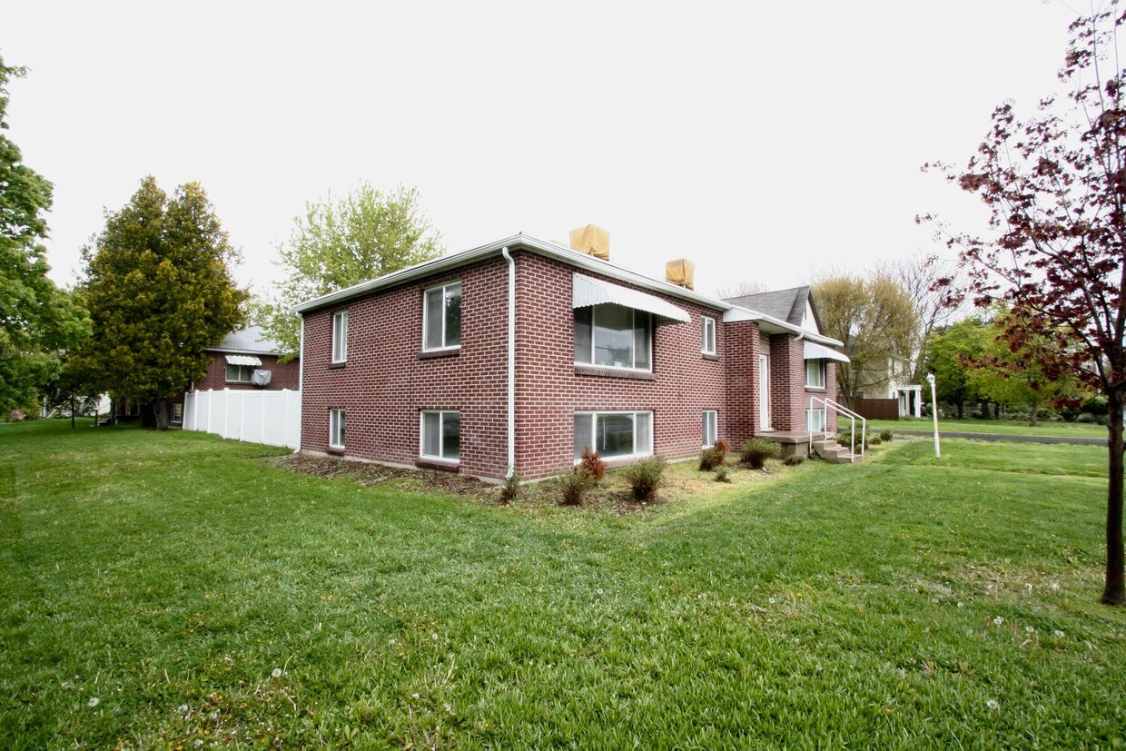 Property has a large grass front yard - 1521 S 500 E