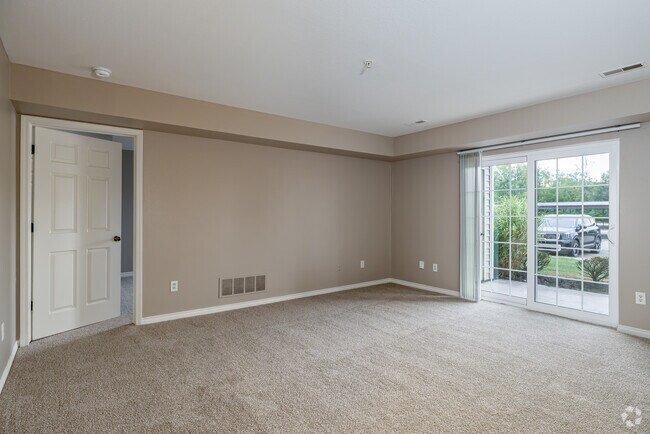 2 habitaciones, 2 baños - 1115 pies cuadrados - Lancaster - Sala de estar - Stratford Place at Brownstown