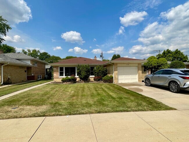 Building Photo - 7150 N Crawford Ave