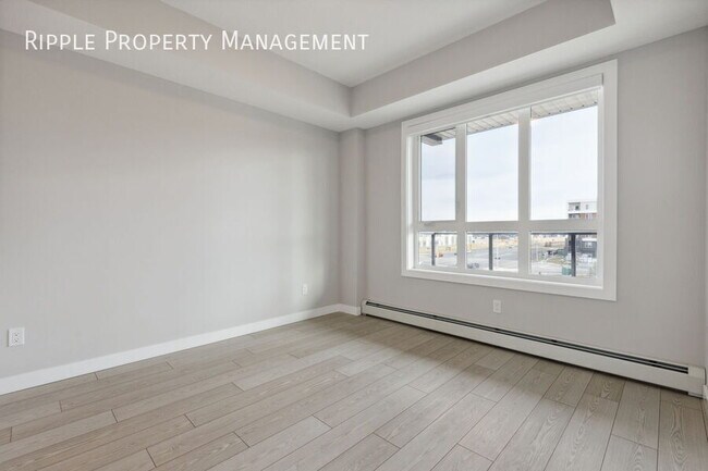 Photo du bâtiment - AMAZING 2 BEDS+DEN/ 2 BATHS CONDO WITH UNDERGROUND PARKING!