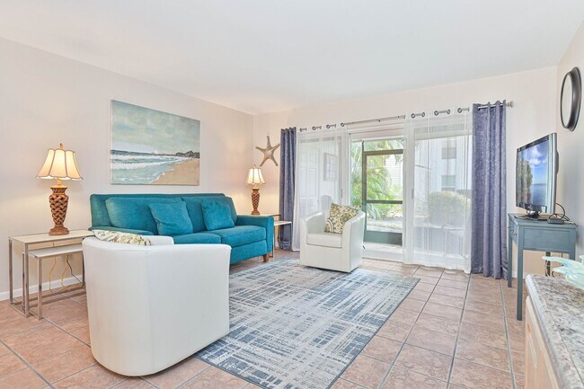 Building Photo - NOW AVAILABLE - Beautiful Condo in Cardinal Cove!