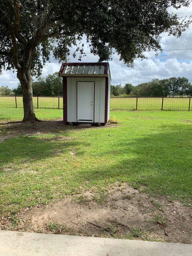 Outside shed - 127 W Menard Rd