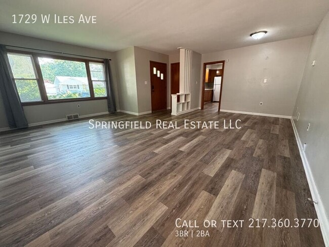 Building Photo - 1729 W Iles Ave