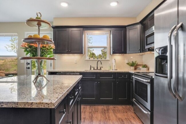 Building Photo - Beautiful Serrano Townhome with Walk-out Basement