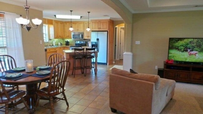 Building Photo - Modern Elegance Meets Spacious Comfort: 4B...