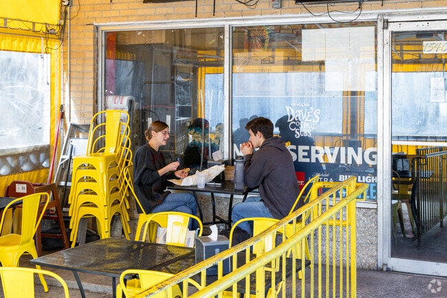 A couple grabs lunch at Dave's Cosmic Subs in the Emory Village area of Druid Hills.