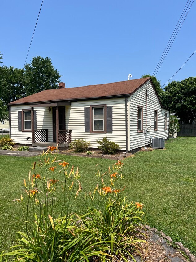 Front Side view with yard - 808 Cheri Way