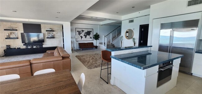 Building Photo - 9499 Collins Ave