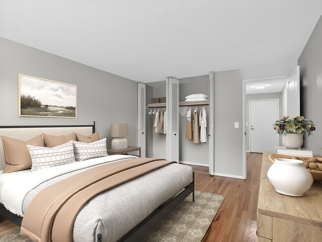 Welcome to Eagle Rock Apartments at West Hartford, where modern design meets comfort. This inviting bedroom features ample closet space and stylish decor, creating an ideal retreat. Schedule a tour today to envision your new home! - Eagle Rock Apartments at West Hartford