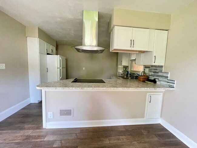 Building Photo - WOODLAND - Exceptional 2 Bedroom Available!