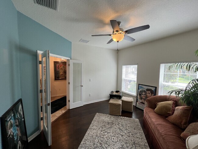 Building Photo - "Spacious 4-Bedroom Lutz Home with Elegant...