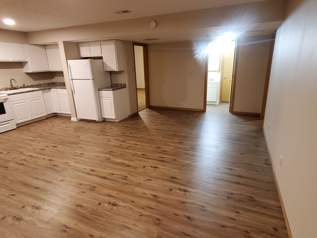 Kitchen open to living room - 103 W Eldora Ave