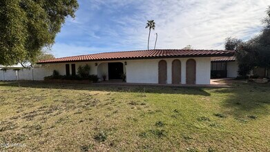 Building Photo - 9427 S 51st Dr