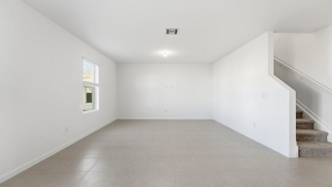 Building Photo - 10761 NW Everbreeze Dr