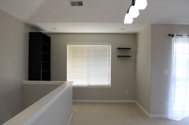 Building Photo - Low-Maintenance Luxury with Community Perks