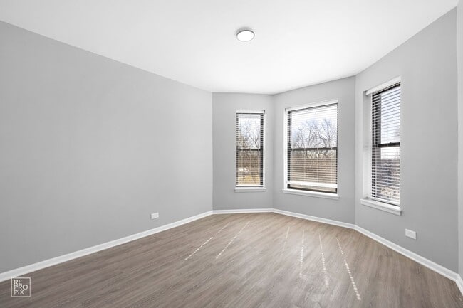 Building Photo - 5051 S Forrestville Ave