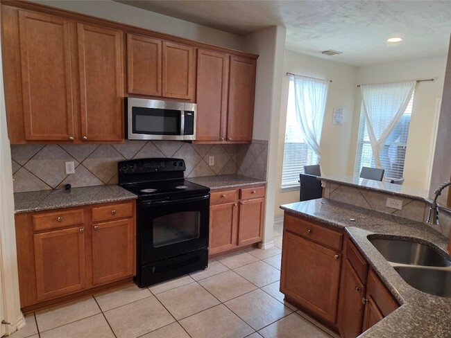 Foto del edificio - 6818 Stoneyvale Dr